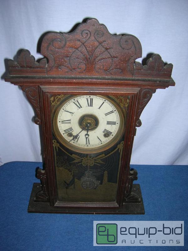 lot 664 image: Antique E. N. Welch Shelf Mantle Glass Front Nautical Theme Coil Clock w Key