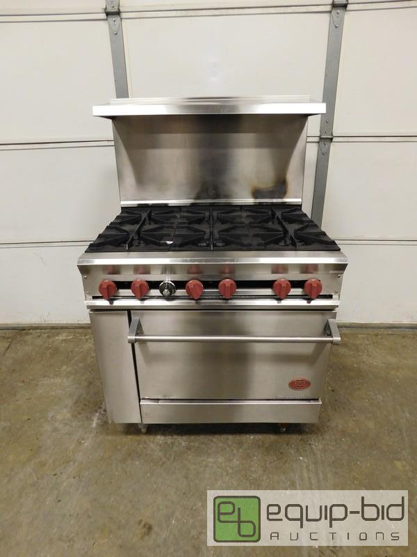 lot 449 image: DCS 6 Burner Range With Oven Below
