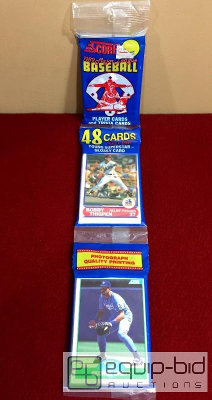 lot 1072 image: RARE 1989 SCORE RACK PACK WITH GEORGE BRETT & CAL RIPKEN SHOWING ON FRONT - 2 HALL OF FAMERS 