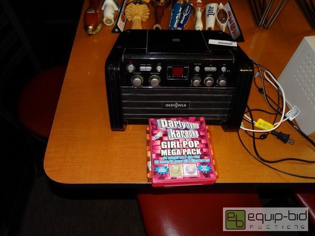 lot 569 image: Insignia Karaoke Machine With (2) CD Packs