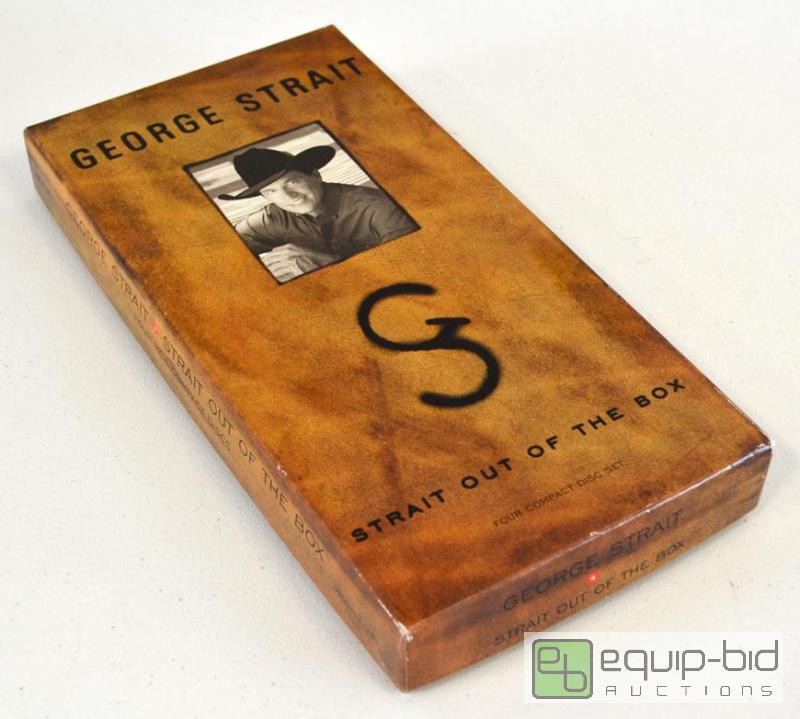 lot 5100 image: George Strait 4 CD Set
