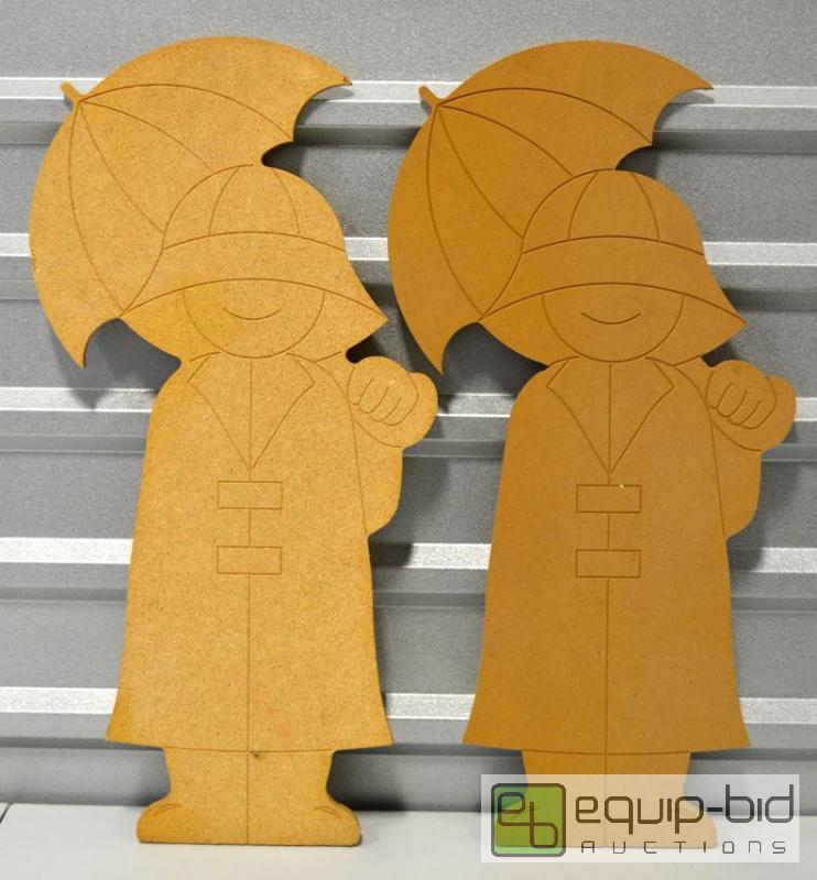 lot 5111 image: Wood Cutouts of Boy in Rain Gear