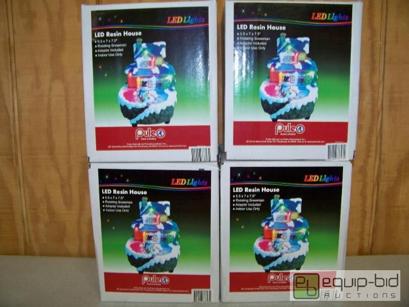 lot 1000 image: Case of 4 Puleo LED Resin House with Rotating Snowman