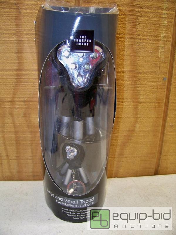 lot 1423 image: Sharper Image Set of 2 Large and Small Tripod Flashlights