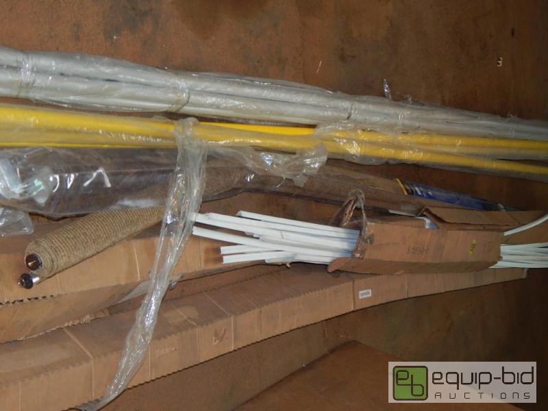 lot 1011 image: Long lot of Poles and Trim