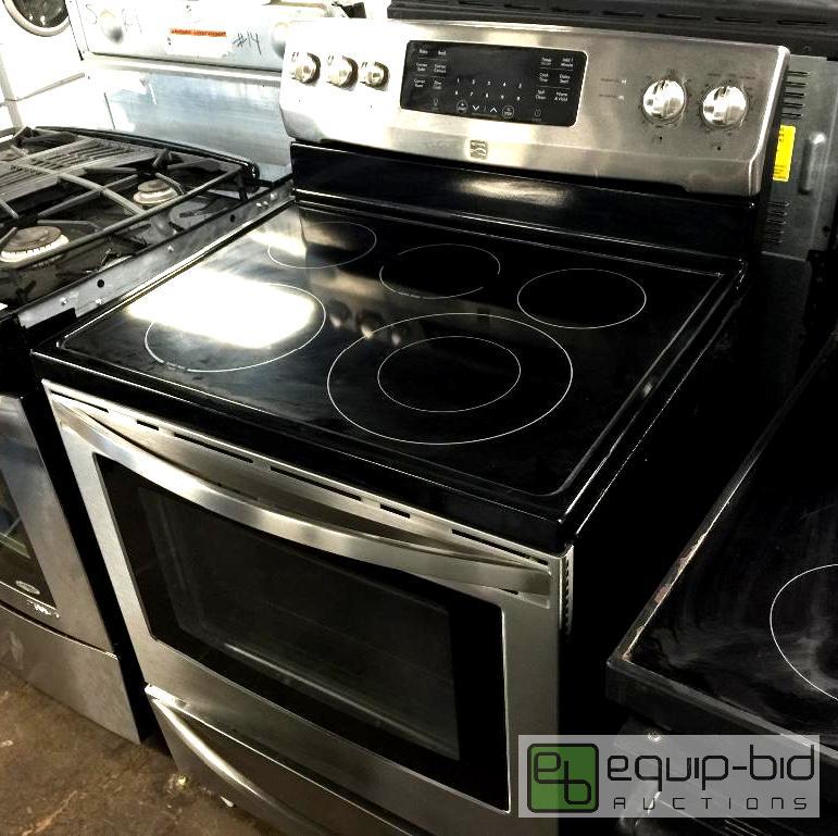lot 1403 image: KENMORE 5.7 cu. ft. Electric Range w True Convection - Stainless Steel
