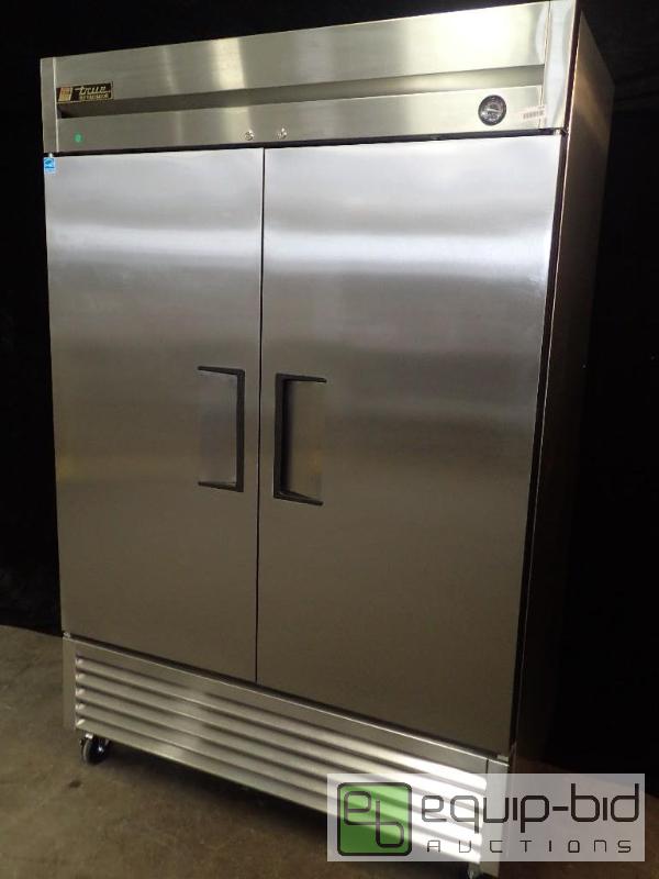 lot 7129 image: True 55 Solid Door Reach-In Refrigerator (T-49)