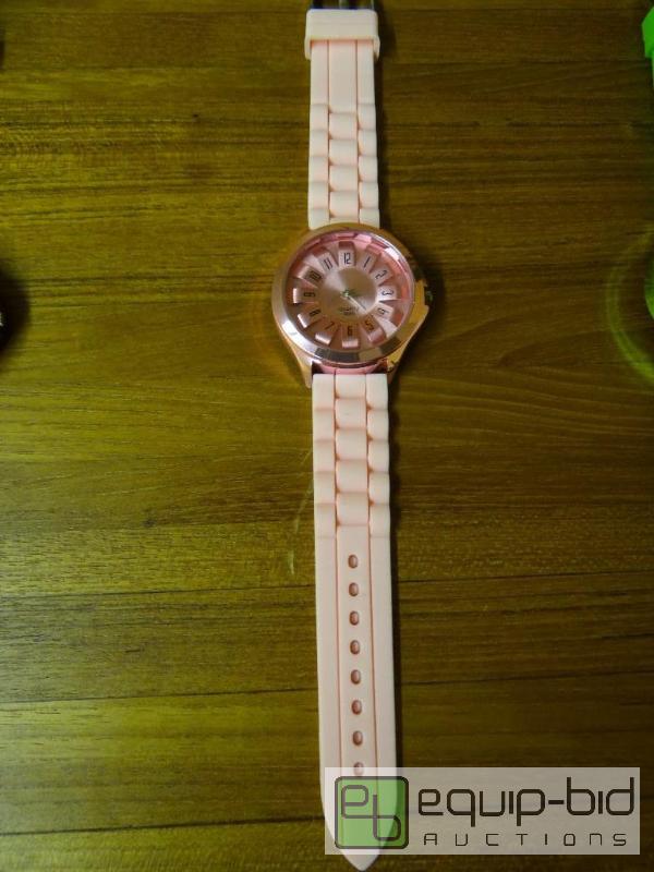 lot 1123 image: New quartz watch with rubber watch band.  Nic...
