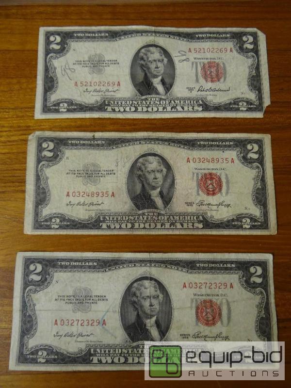 lot 1154 image: Lot of 3 red seal 2 dollar bills.  All 3 date...