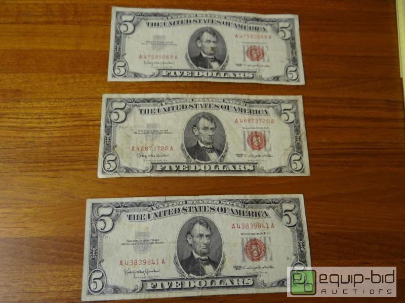 lot 1159 image: Lot of 3 red seal 5 dollar bills.  Dated 1963...