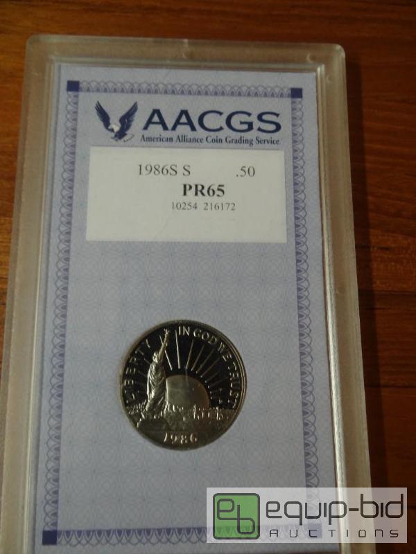lot 1175 image: AACGS&nbspgraded 1986 half dollar in case....