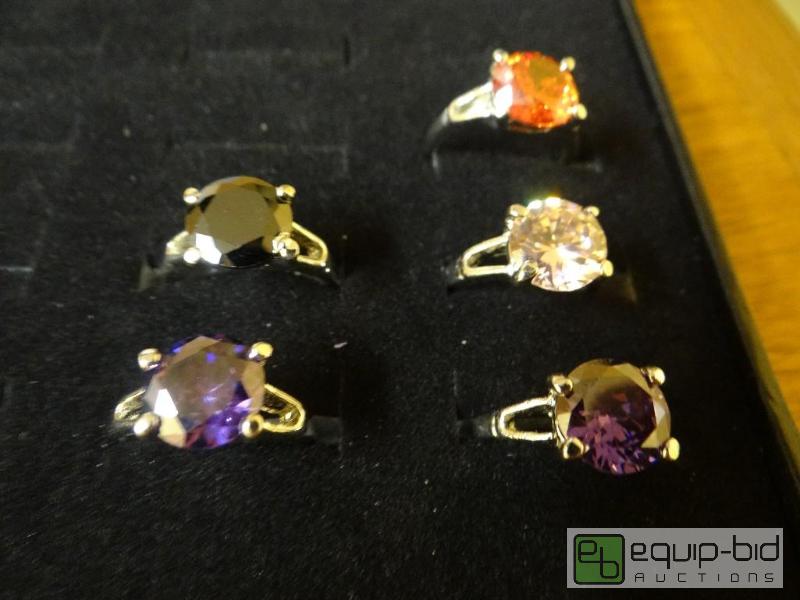 lot 1199 image: Lot of 5 various rings.  Ring display not inc...