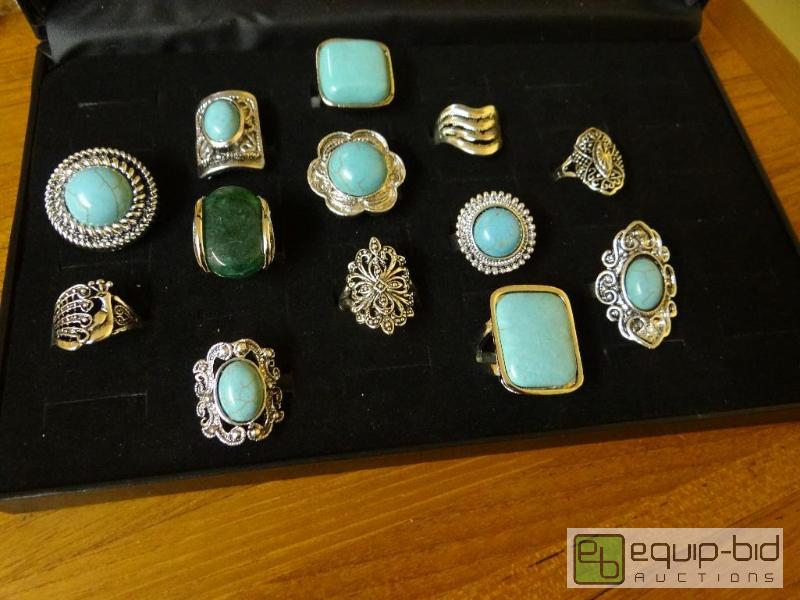 lot 1202 image: Lot of 13 various rings.  Ring display not in...