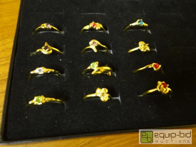 lot 1203 image: Lot of 12 various rings.  Ring display not in...