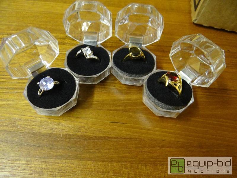 lot 1217 image: Lot of 4 various rings.  Ring boxes are inclu...
