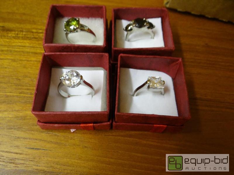 lot 1218 image: Lot of 4 various rings.  Ring boxes are inclu...