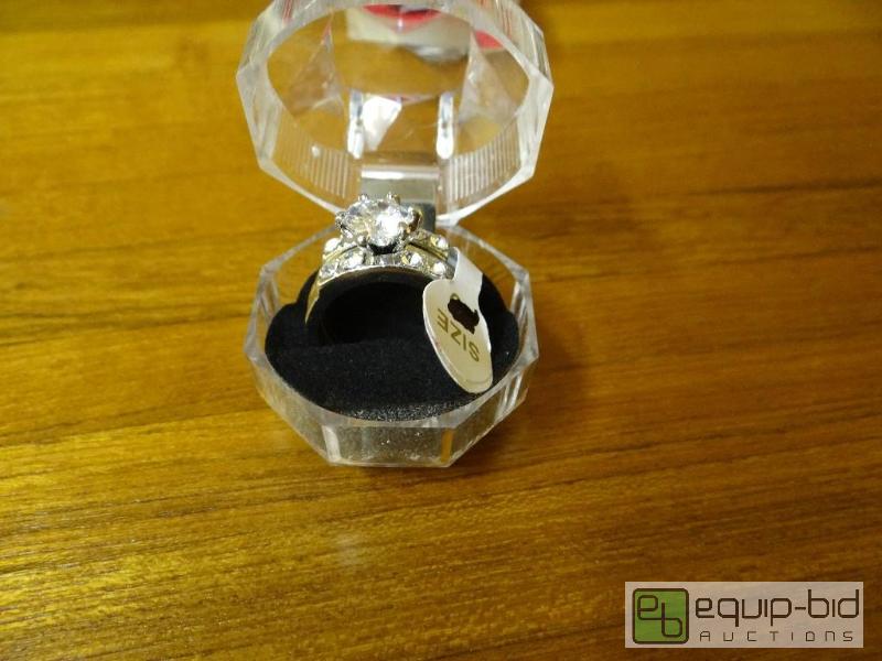 lot 1224 image: Electroplated engagement ring set in ring box...