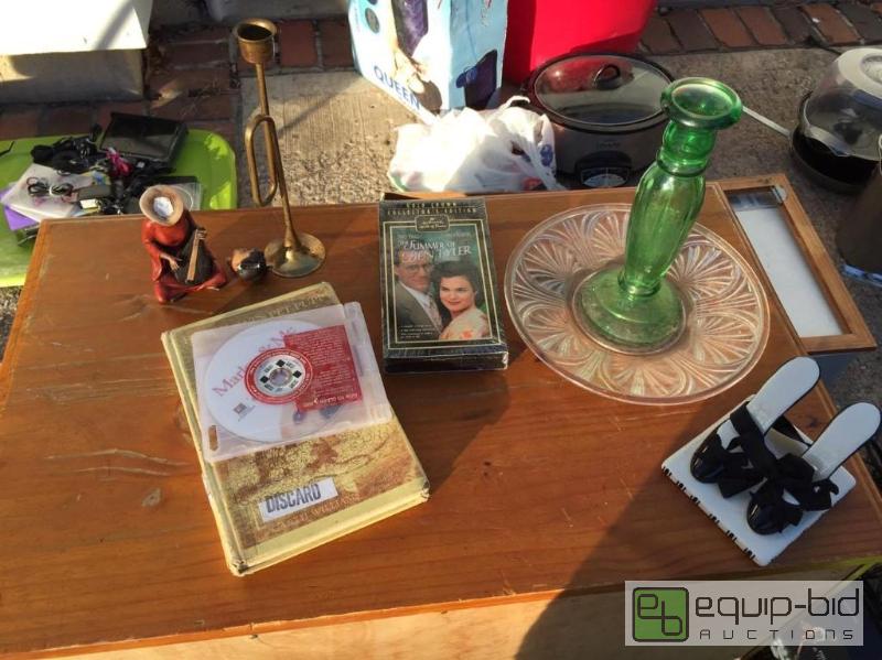 lot 242 image: Brass Candle Stick, Vintage Childrens Book, Glassware, Shoe Decoration, VHS and DVD