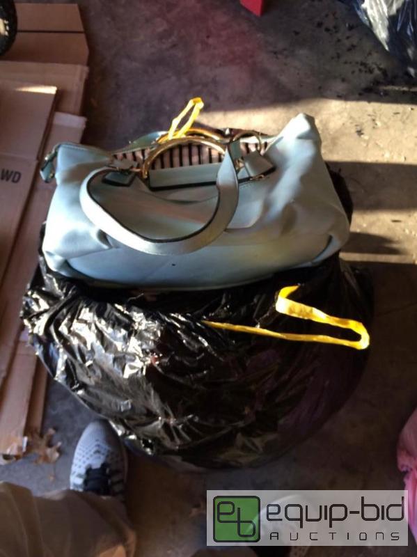 lot 250 image: Mystery Trash Bag  Blue Leather Purse