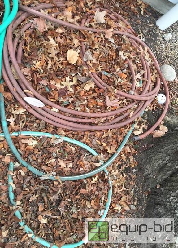 lot 3000 image: 2 Hoses plus Decorative Rock