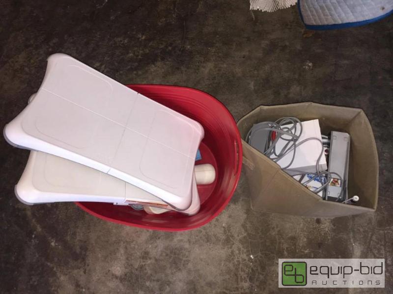 lot 53 image: Large Lot Wii Balance Boards, Console, Remotes, Games, Chargers and other items