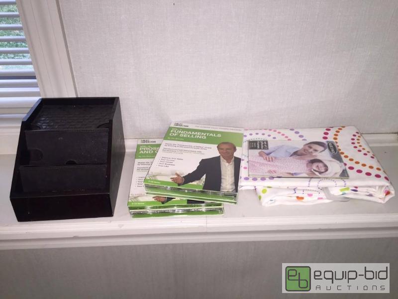 lot 64 image: Linens, Leather Phone holder, NIB Sales Super Star DVDS, more.