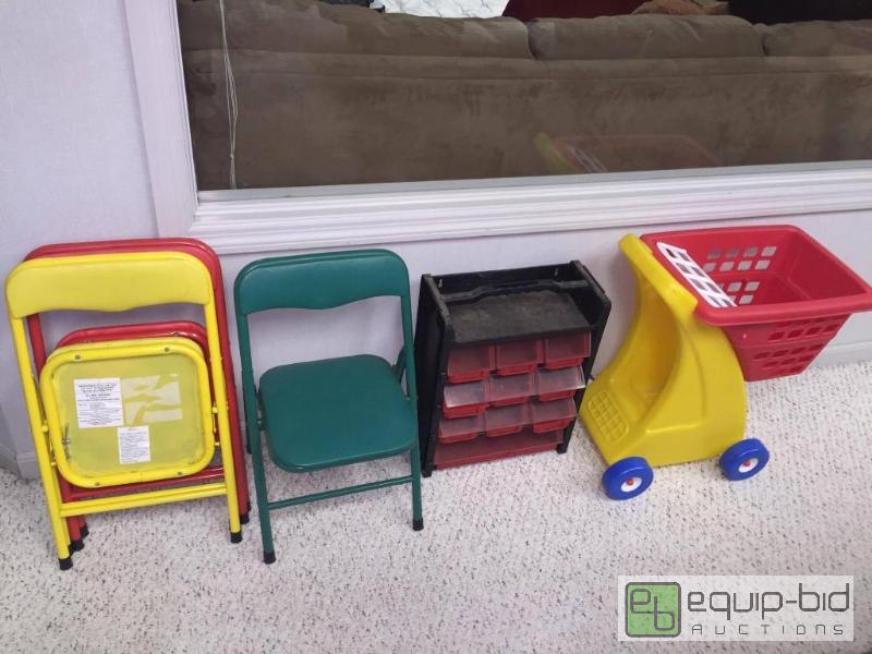 lot 73 image: Childs Plastic Shopping Car, Plastic Tool Organizer, and Childs COSCO Folding Chairs