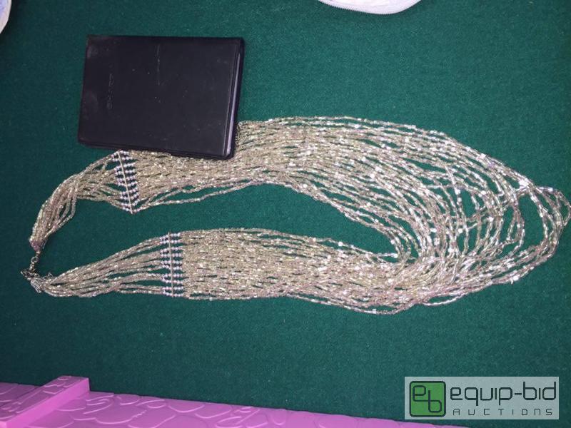 lot 99 image: Sharp Calculator and Glass Beaded Necklace