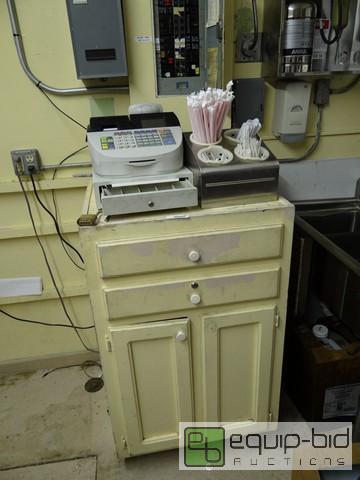 lot 480 image: Royal Alpha 710ML Cash Register, Silverware Rack And Hostess Station