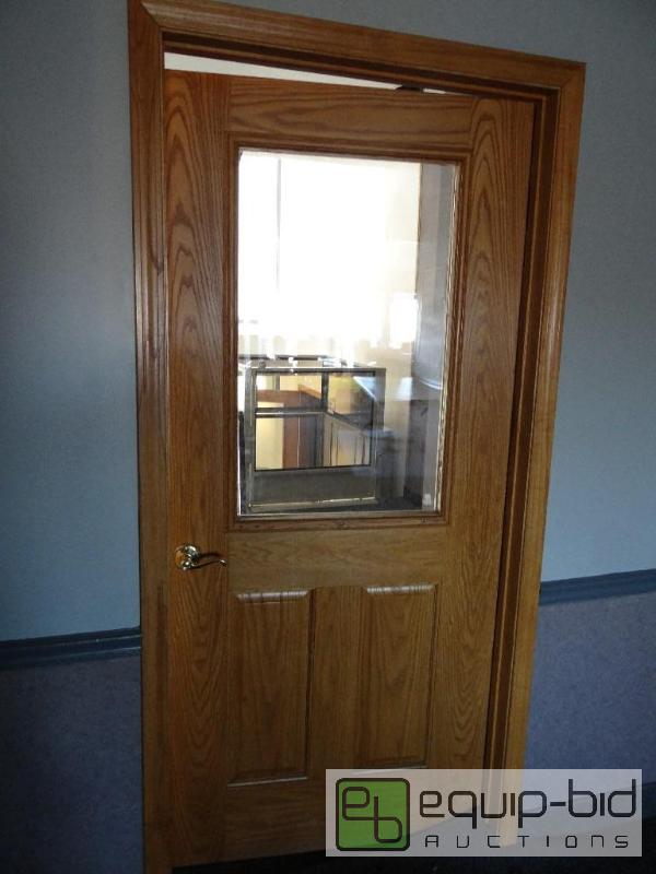 lot 552 image: Solid Oak Light Wood Single Glass Entry Door w Frame