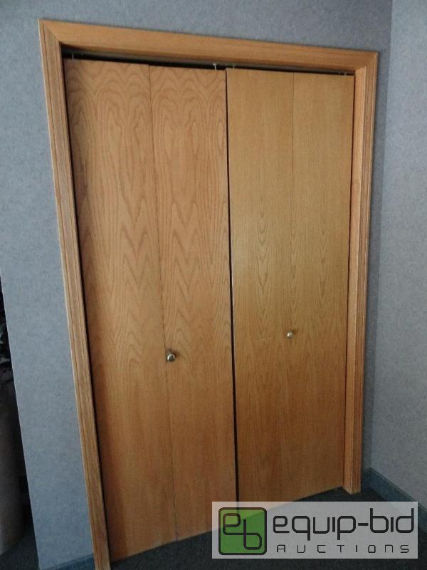 lot 553 image: Light Wood Bi Folding Doors w FrameFits 48w x 80 tall Frame
