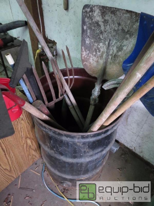 lot 172 image: 55 Gallon Drum of Hand Tools Brooms, Shovels etc.
