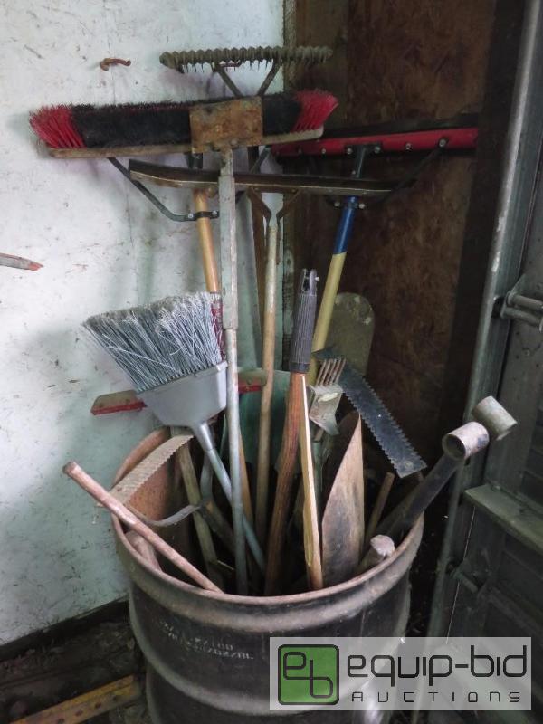 lot 174 image: 55 Gallon Drum of Hand Tools Brooms, Shovels etc.