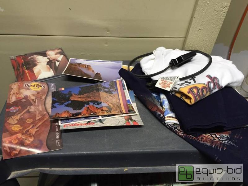 lot 143 image: Various Postcards, Hard Rock Cafe Collectibles, Wedding CD, Adapter Cord.