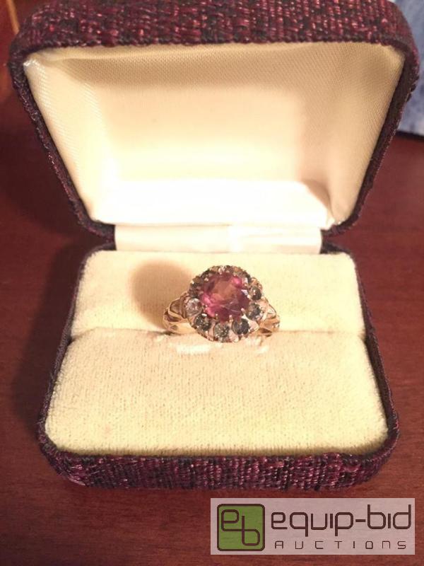 lot 205 image: 10k Solid Yellow Gold Ladies Ring with Unknown Stones