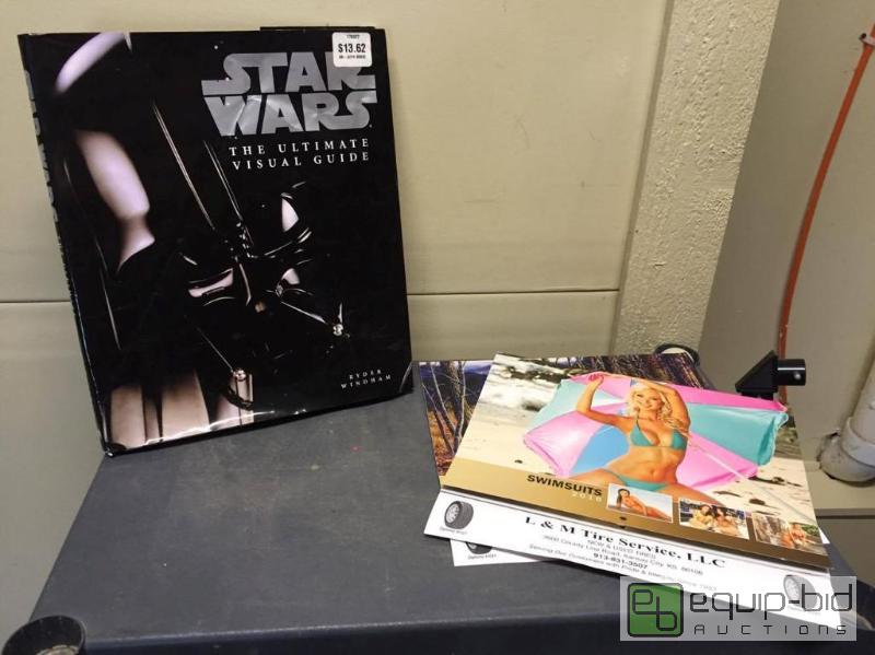 lot 220 image: Star Wars the Ultimate Visual Guide Book by DK plus Advertising Calendars