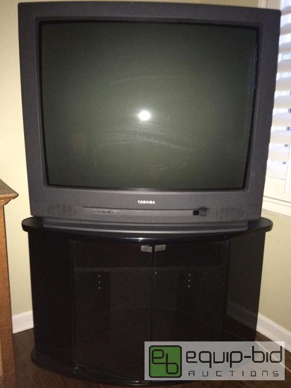 lot 238 image: Toshiba Color TV plus TV Stand