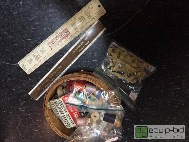 lot 98 image: Old Pine Needle Sewing Basket full of Supplies, Two Local advertising Rulers