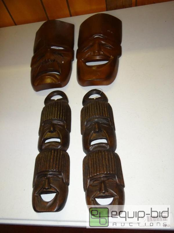 lot 1447 image: Lot of 4 wood carved masks....