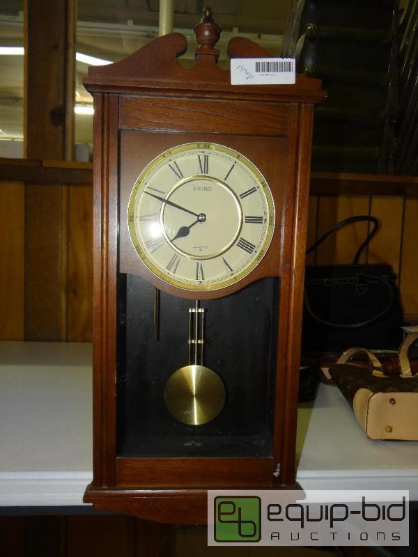 lot 1448 image: Seiko wall clock.  22&quot tall....