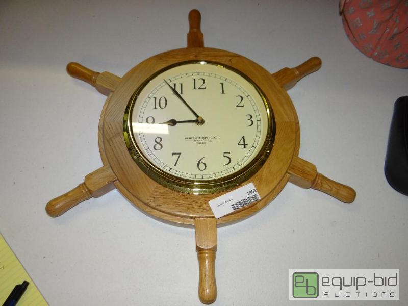 lot 1451 image: Oak captains clock.  12&quot round....