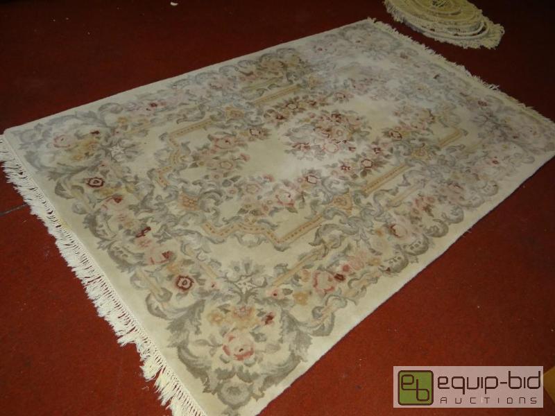 lot 1462 image: Nice thick area rug,  5 x 8.  You can tell ...