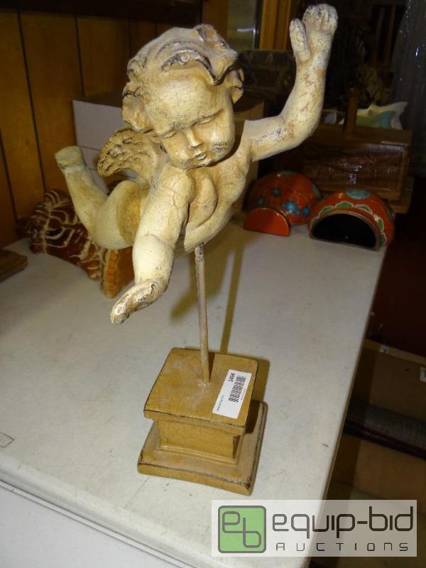 lot 1494 image: Wood carved cherub on wood base.  17&quot ta...