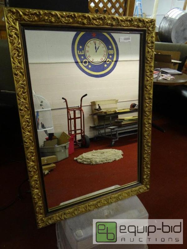 lot 1555 image: Large wood framed wall mirror.  24&quot x 36...