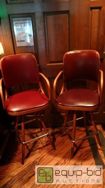 lot 809 image: (2) Teak Dark Red Vinyl Padded Bar Height Chairs
