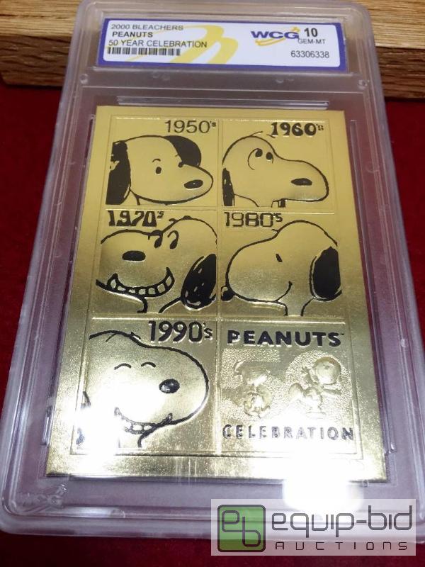 lot 1027 image: SNOOPY PEANUTS 23K Gold Card 50th Anniversary - GEM MINT 10 - GRADED VALUE $100