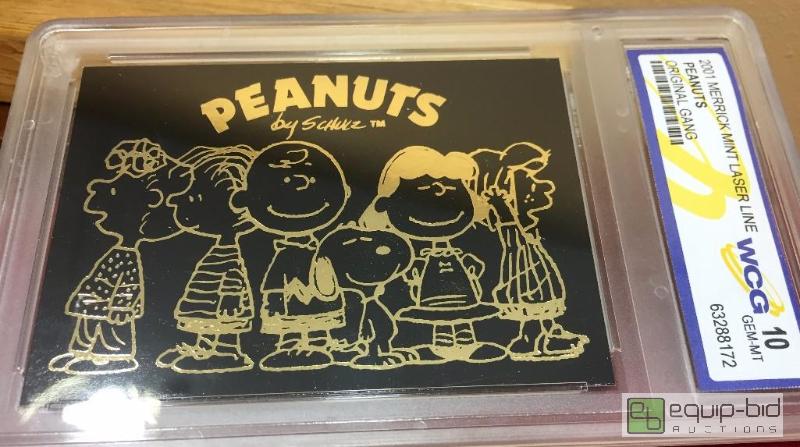 lot 1028 image: PEANUTS GANG Laser Line BLACK 23 KT GOLD CHARLIE BROWN SNOOPY GRADED GEM MINT 10 - GRADED VALUE $100