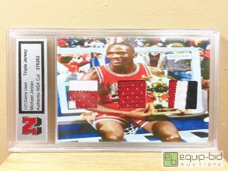lot 989 image: MICHAEL JORDAN #11 GAME USED TRIPLE JERSEY CARD - AUTHENTIC NSA CUT WITH COA $750