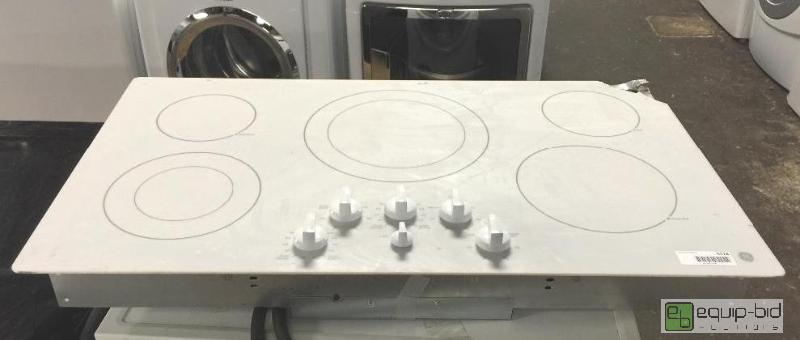 lot 5124 image: GE 36 BUILT-IN KNOB CONTROL ELECTRIC COOKTOP