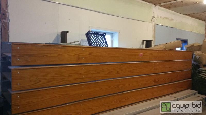 lot 1 image: 16 foot section of retractable bleachers.  Th...